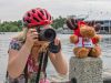 A guest is taking a picture at Dow’s Lake during a private best of Ottawa day tour by bike in Ottawa by Escape on Sparks