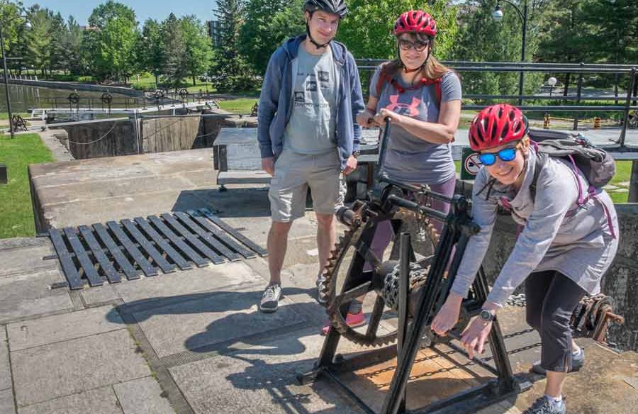 Small group of friends enjoying Escape Ottawa highlights bike tour at Ottawa Landmarks, arboretum and Rideau Canal locks