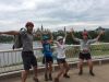 Family is happy at the Museum of History lookout at with a view of Parliament building on an Ottawa express bike tour